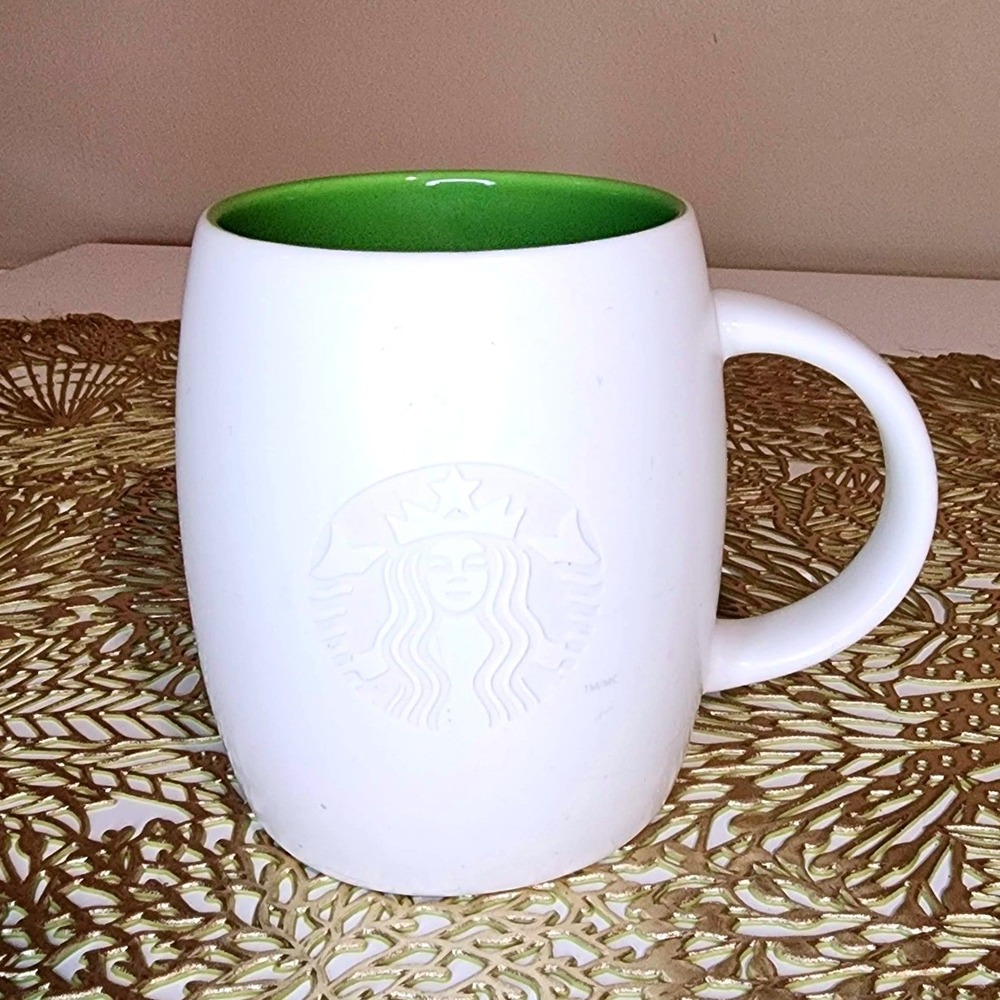 Starbucks 2011 White Ovals Embossed Siren Logo Coffee Mug Green Inside 16oz